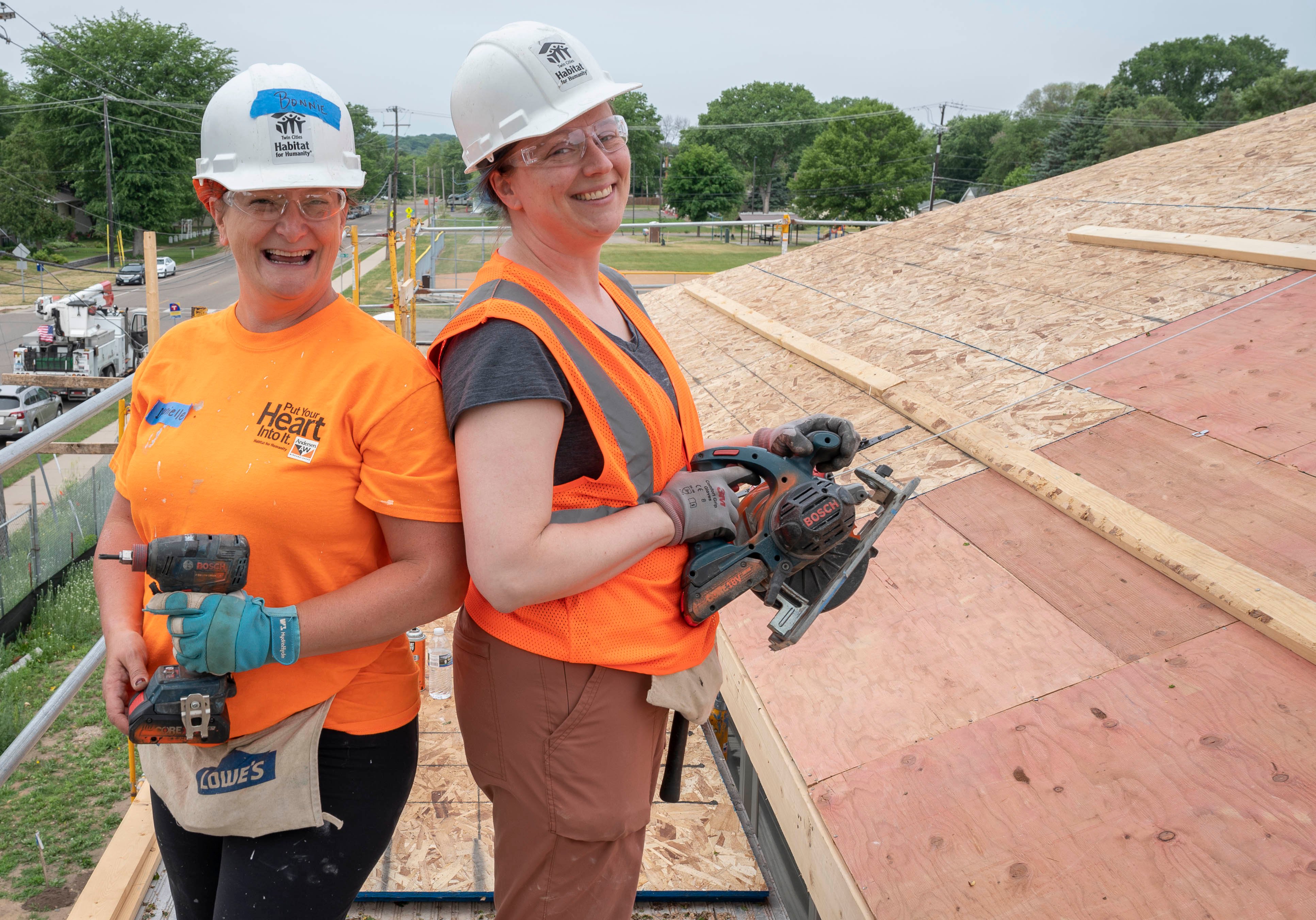 Volunteers smiling.