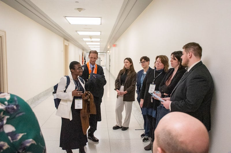 A Habitat homeowner and other Habitat advocates talking with policymakers at Habitat on the Hill 2025