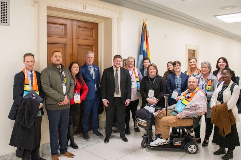 A large group of Habitat advocates from Minnesota outside of a Minnesota Representative's office