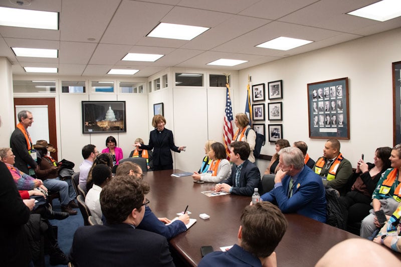 A large group of Habitat advocates share legislative priorities with Senator Tina Smith