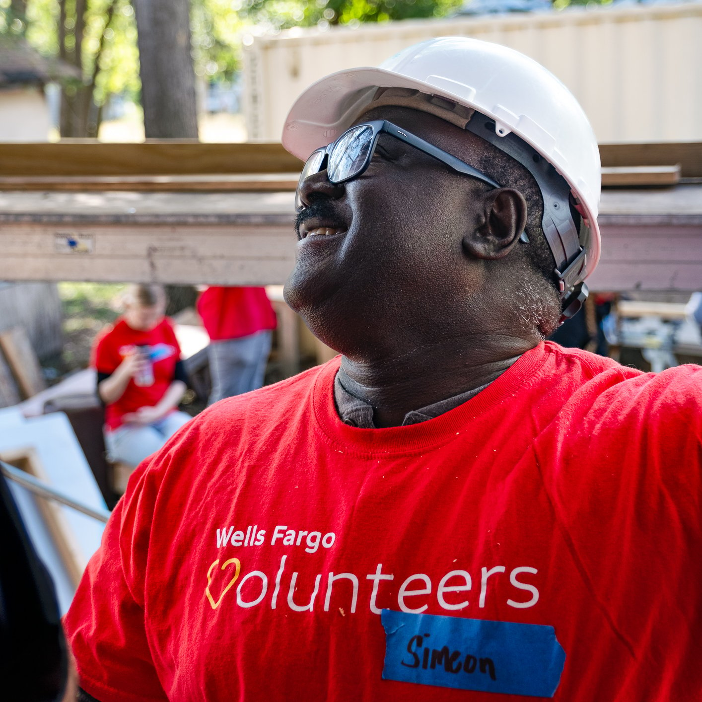 Smiling volunteer.