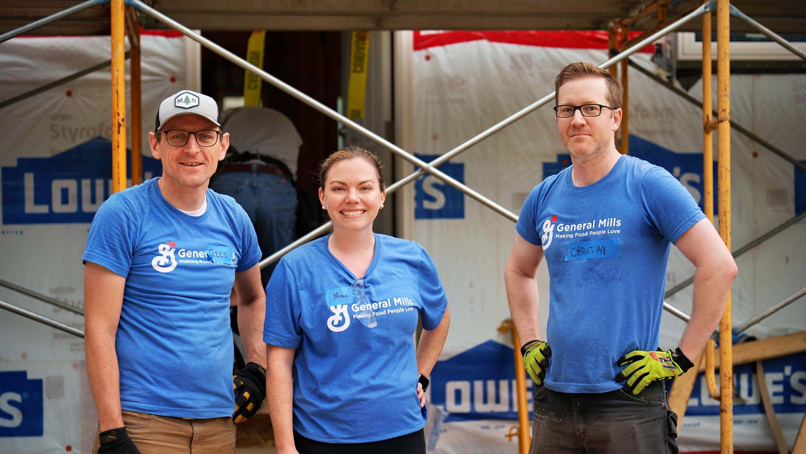 Smiling volunteers.