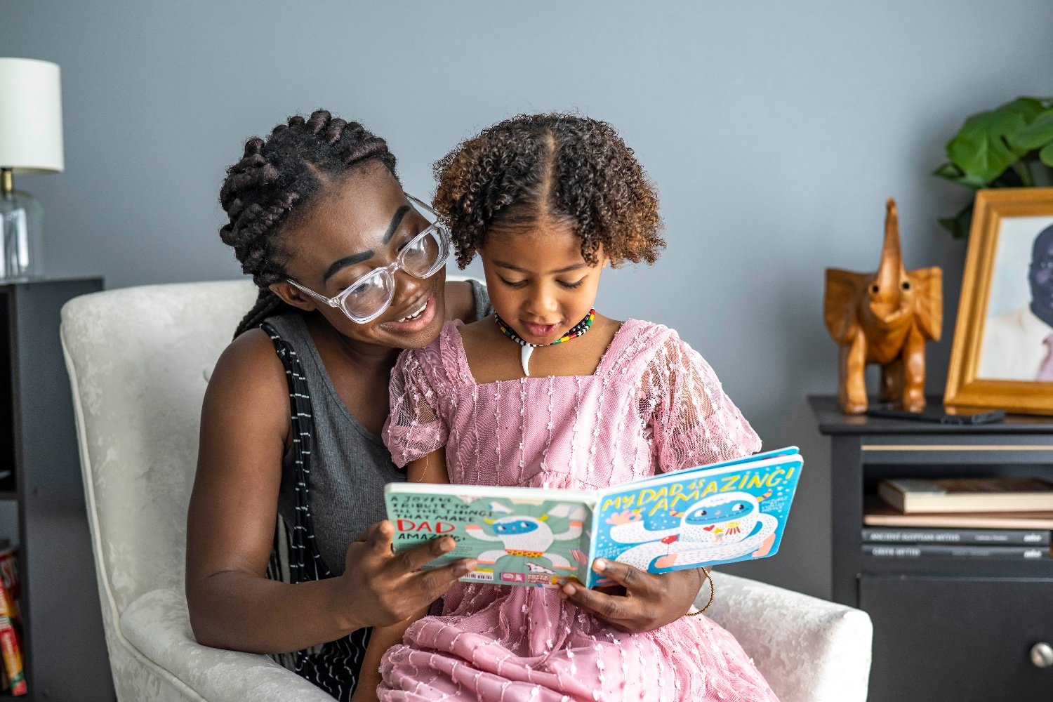 Homeowner Carroll reading to her daughter